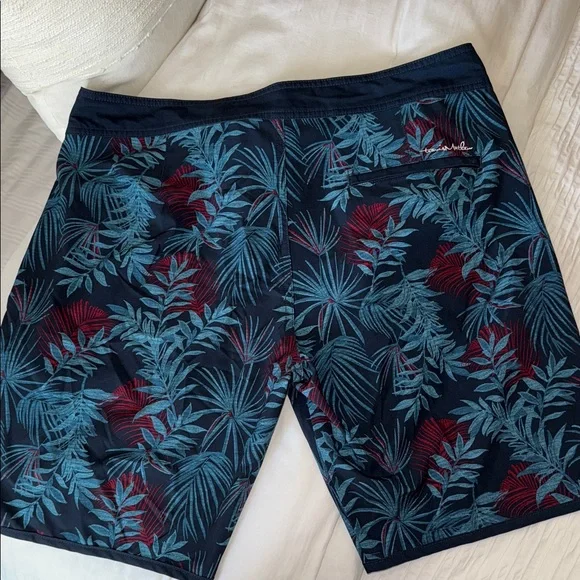 Travis Mathew Navy and Red Tropical Print Board Shorts